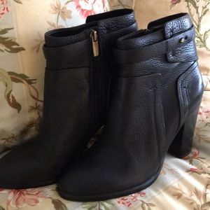 Black leather Vince Camuto ankle boots.